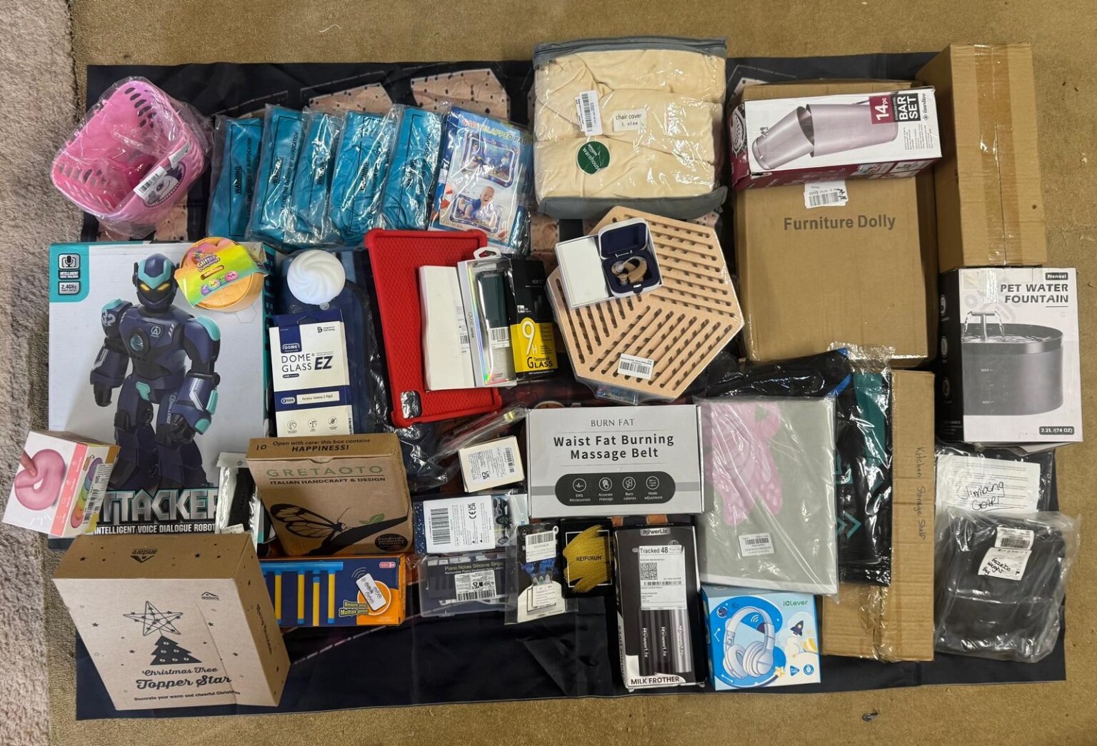 The full mixed contents laid out from a genuine Mega Boost Box