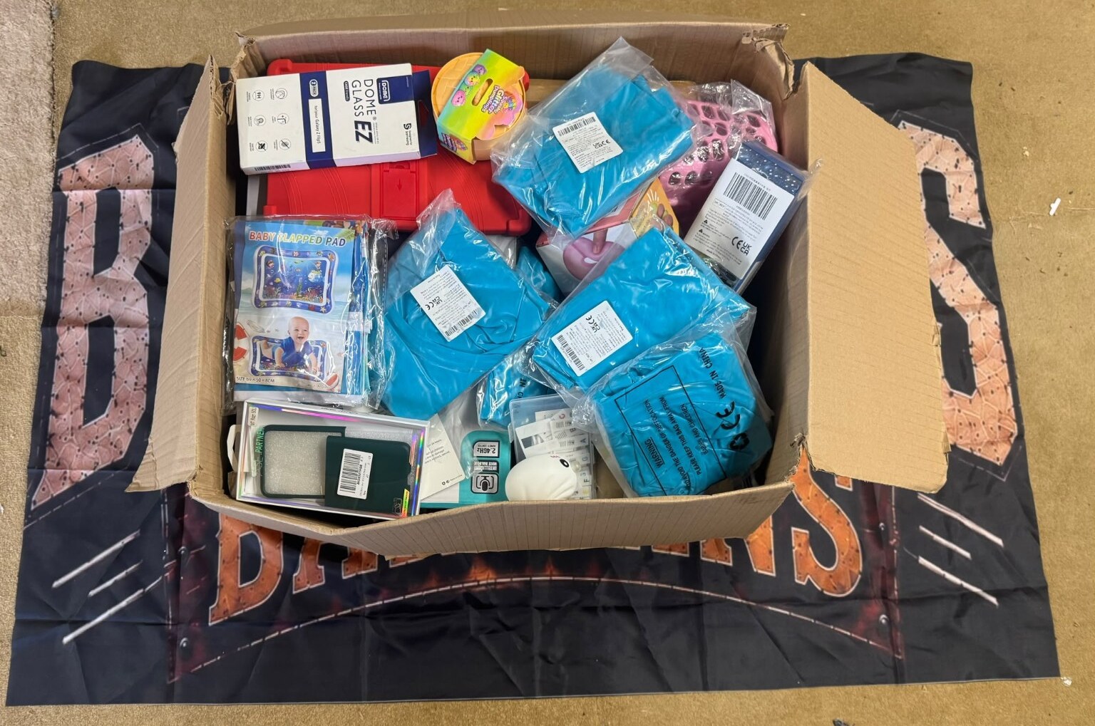 A genuine Mega Boost Box opened to show its untouched mixed contents
