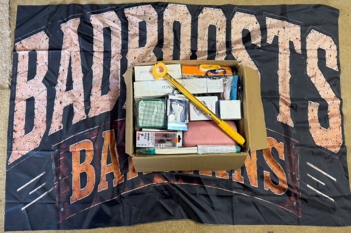 A genuine Badboosts Bargains box shown packed with mixed pallet-pull stock